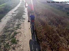A college girl rides her bike and takes on a big ass challenge before getting a public blowjob