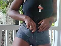 Amateur black girl begs for outdoor pee while wearing shorts