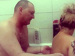A couple enjoys a steamy shower together