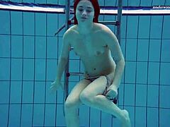 Hot babe Liza Bubarek gets wet in the pool