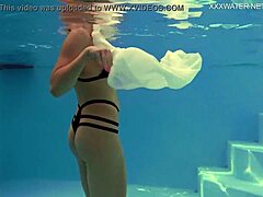 Juicy ass and natural tits in the pool with a Russian pornstar