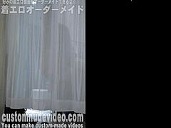 Japanese beauty undresses behind curtain