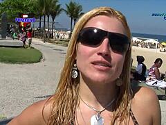 African beauty Fernanda Abraao gets down and dirty on the beach