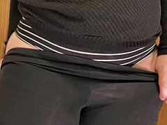 Voluptuous wife flaunts her curves in tight black leggings