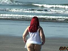 Curvy milf flaunts her assets on the beach in gorgeous sunshine