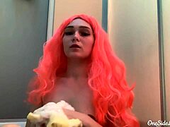 Young mermaid enjoys solo play in the shower