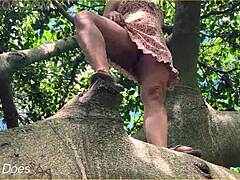 Married woman ascends a tree without underwear on